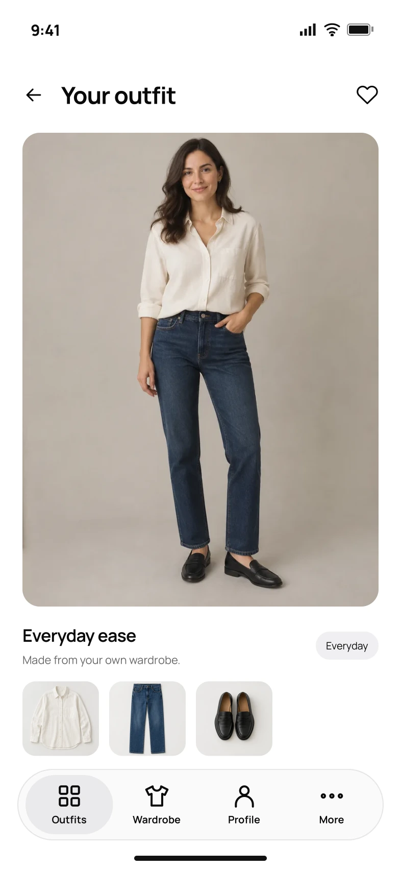 Your outfit: a preview of an ivory shirt, straight jeans and black loafers worn together.